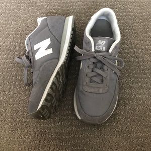 Grey New Balance tennis shoes